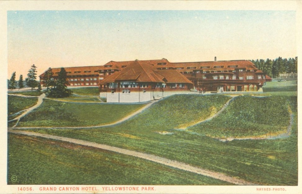 Color illustration of a long multistory brown building on top of a small hill.