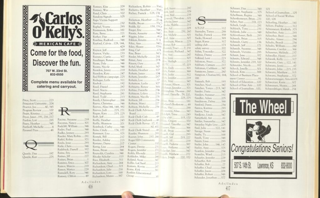 Two-page spread of an index with two black and white advertisements.