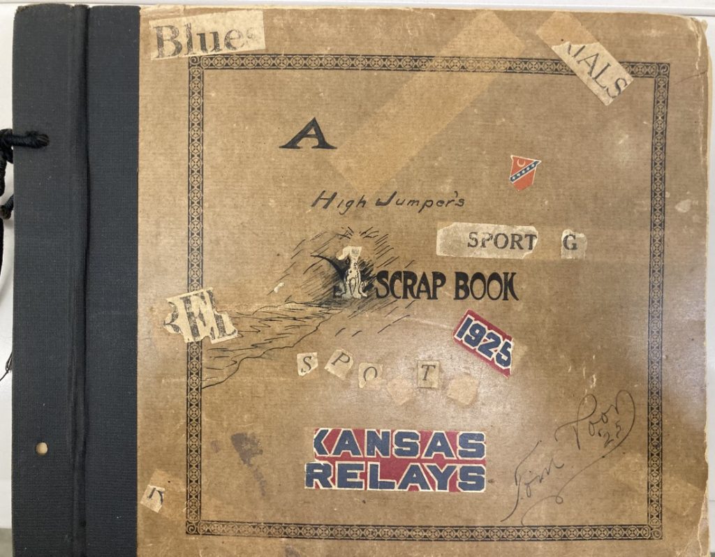 Brown cover with handwritten text and glued-on printed letters.