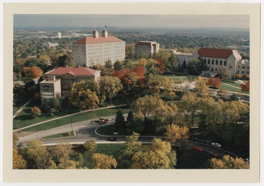 Color photograph of the KU campus with fall foliage. 