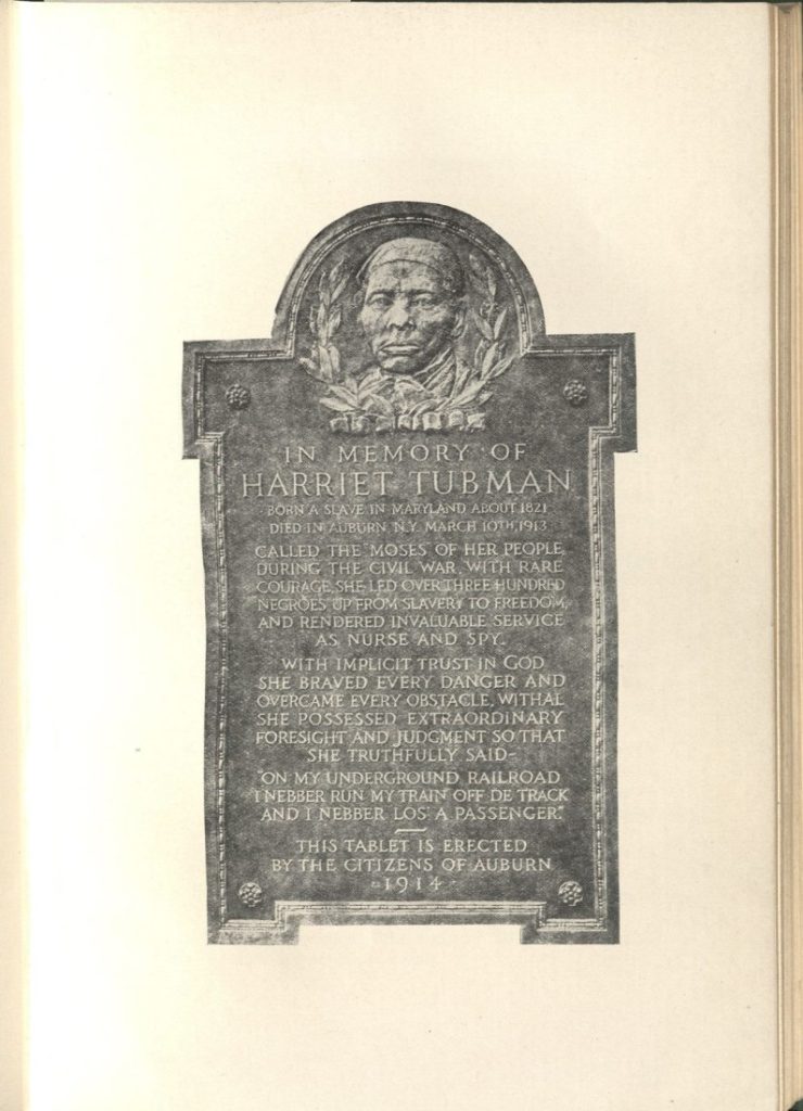 Black-and-white photo of a plaque dedicated to Harriet Tubman.