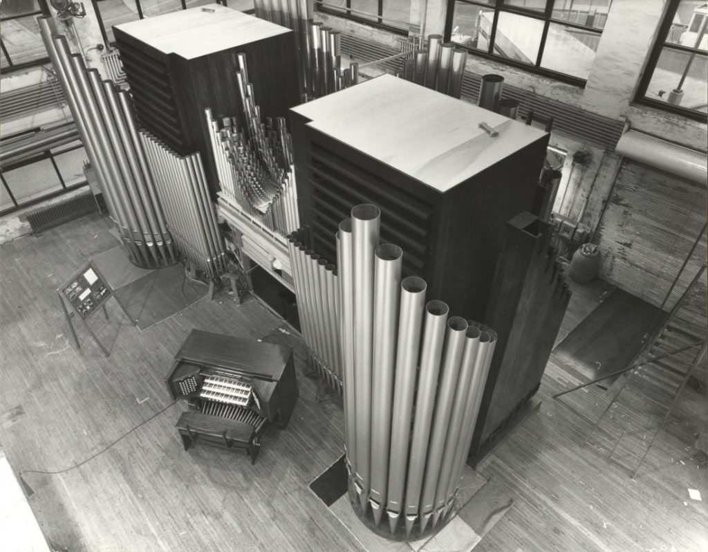 Black-and-white overhead photograph of a large pipe organ.