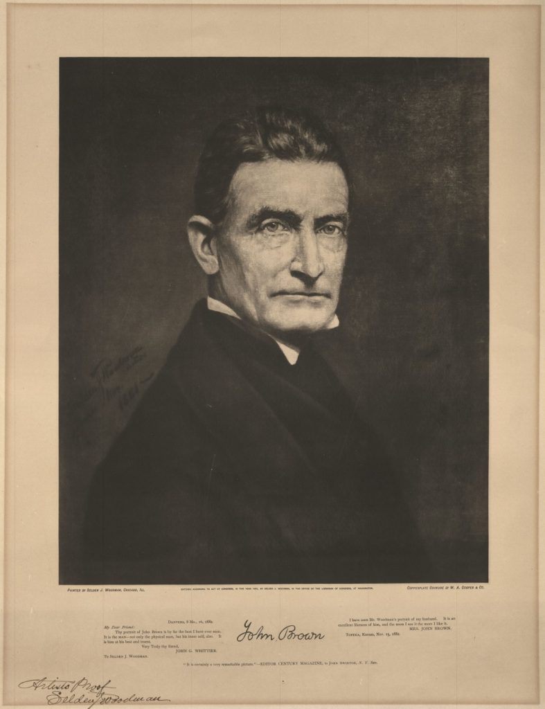 Black-and-white portrait of a white man. There is text at the bottom.