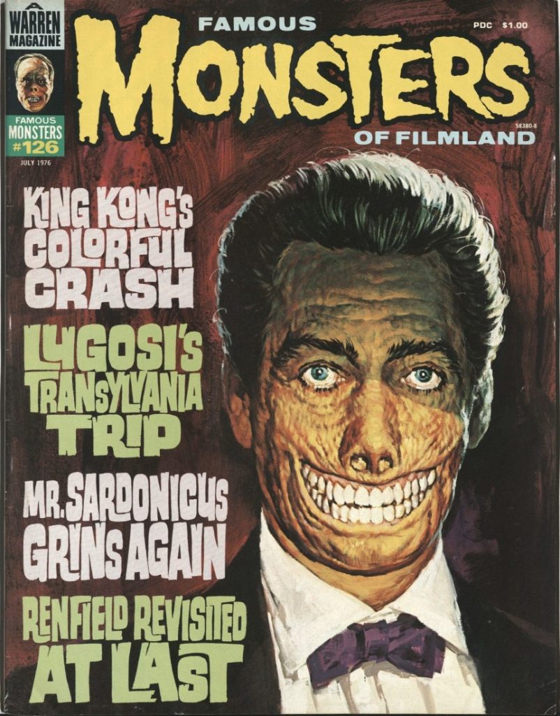 Smiling monster man in a suit with the words "King Kong's Colorful Crash, Lugosi's Transylvania Trip, Mr. Sardonicus Grins Again, Renfield Revisited at Last."