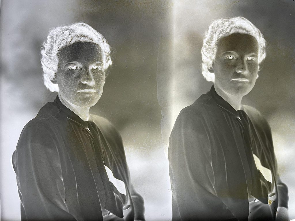 Glass plate negative with scratches on face of left image and no scratches on the right.