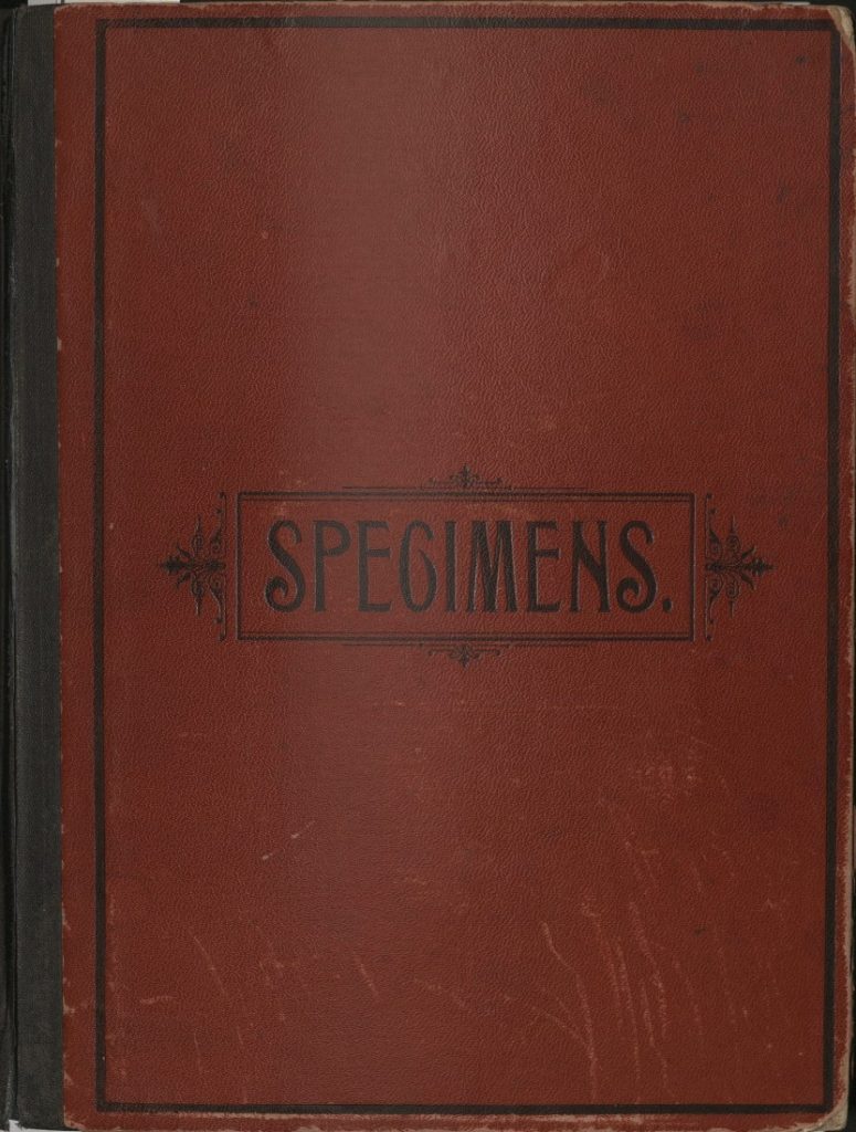 Red book cover with the word "Specimens" in black text.