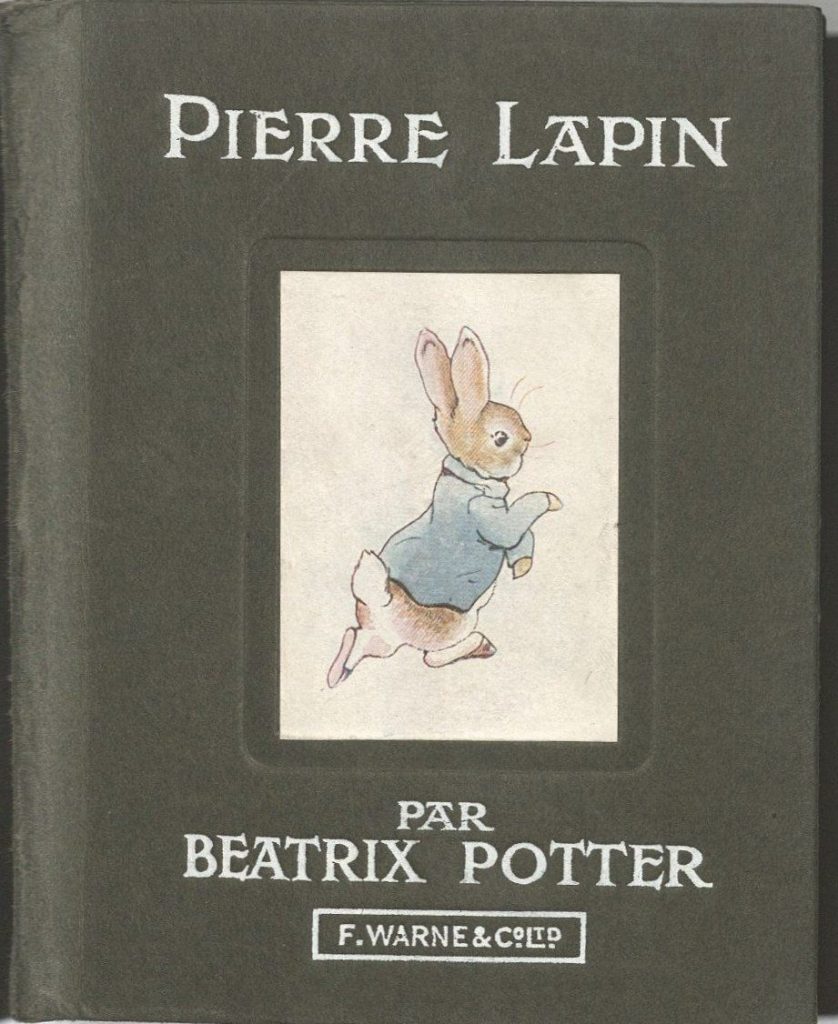 This image has text with a color illustration of a rabbit in a blue jacket.